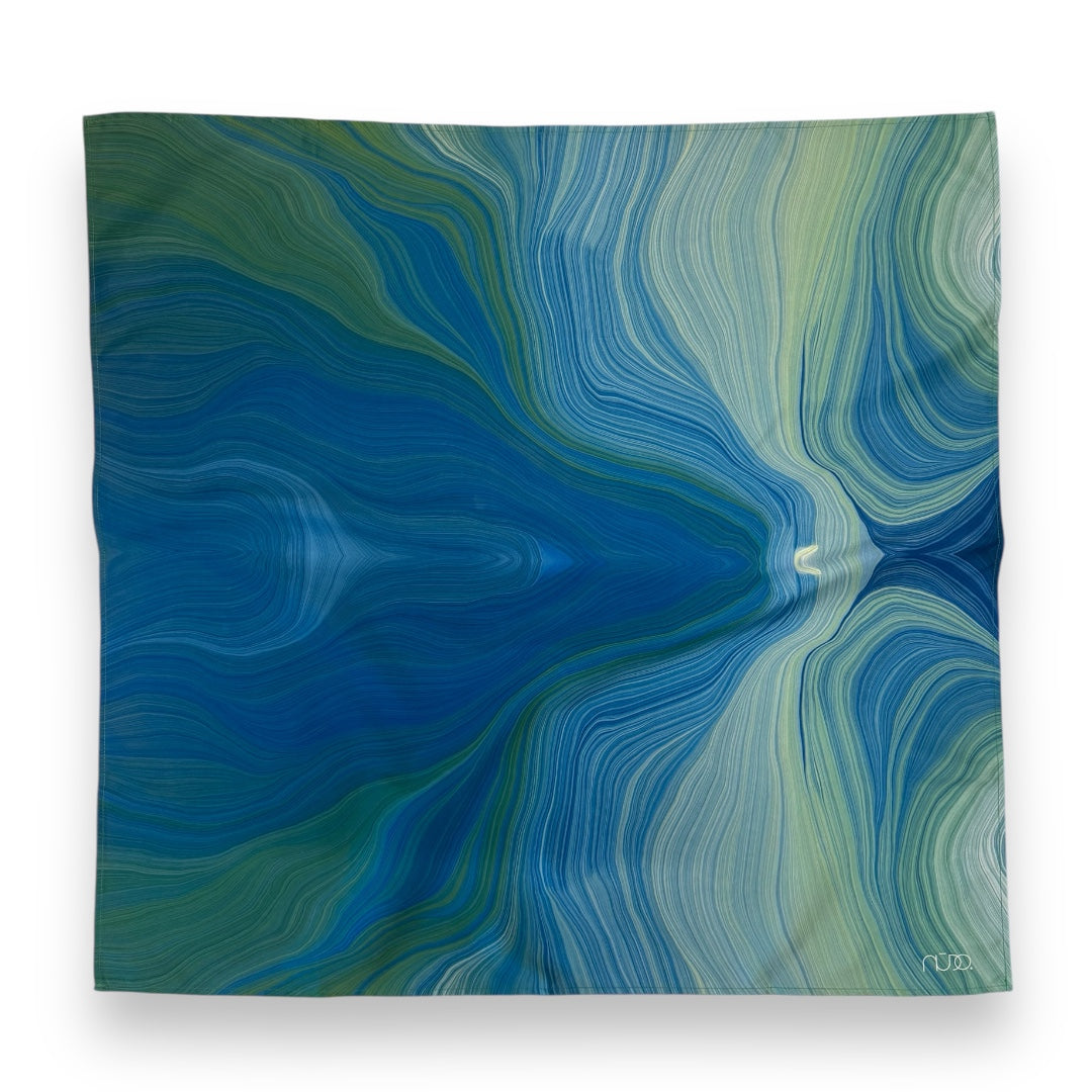 Nudo Aqua Waves square scarf with abstract blue, teal and green marbled print.