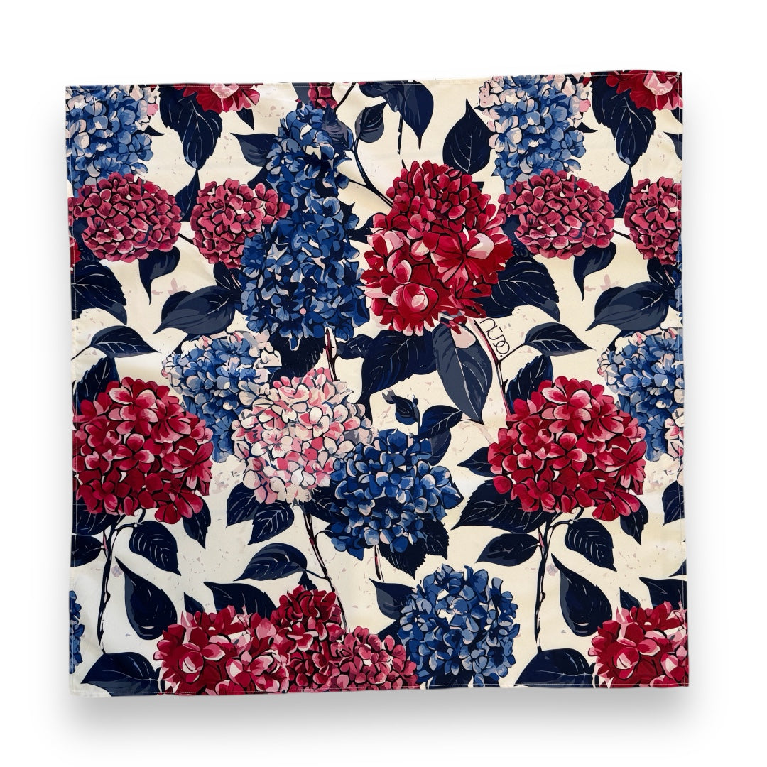 Floral pattern with red and blue flowers on a beige background